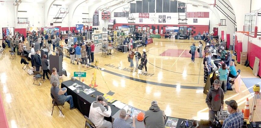 Students fill a gym during a career fair